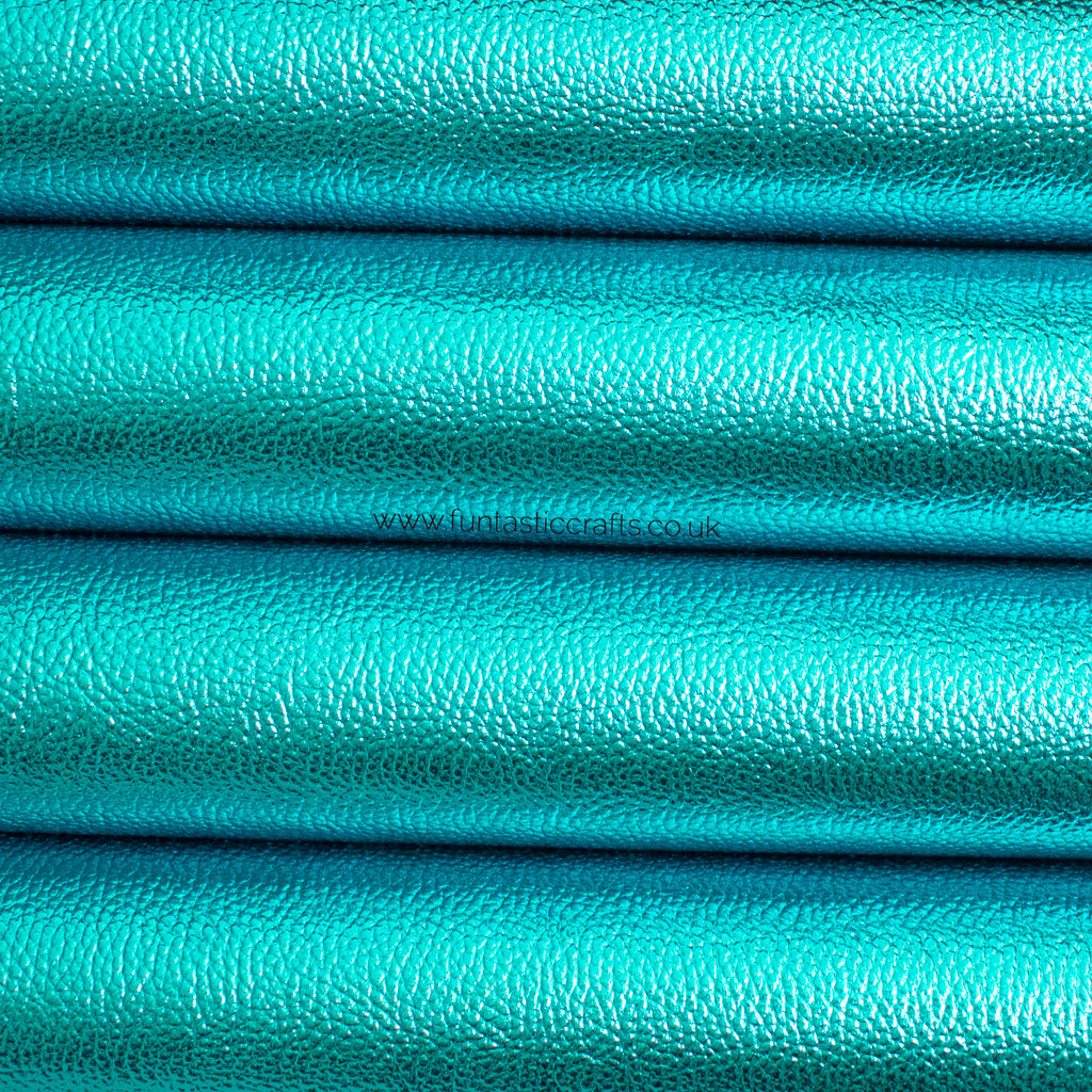 New Caribbean Blue Textured Metallic Leatherette Fabric