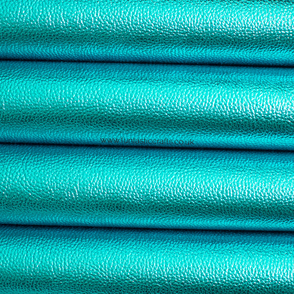 *FLAWED* New Caribbean Blue Textured Metallic Leatherette Fabric