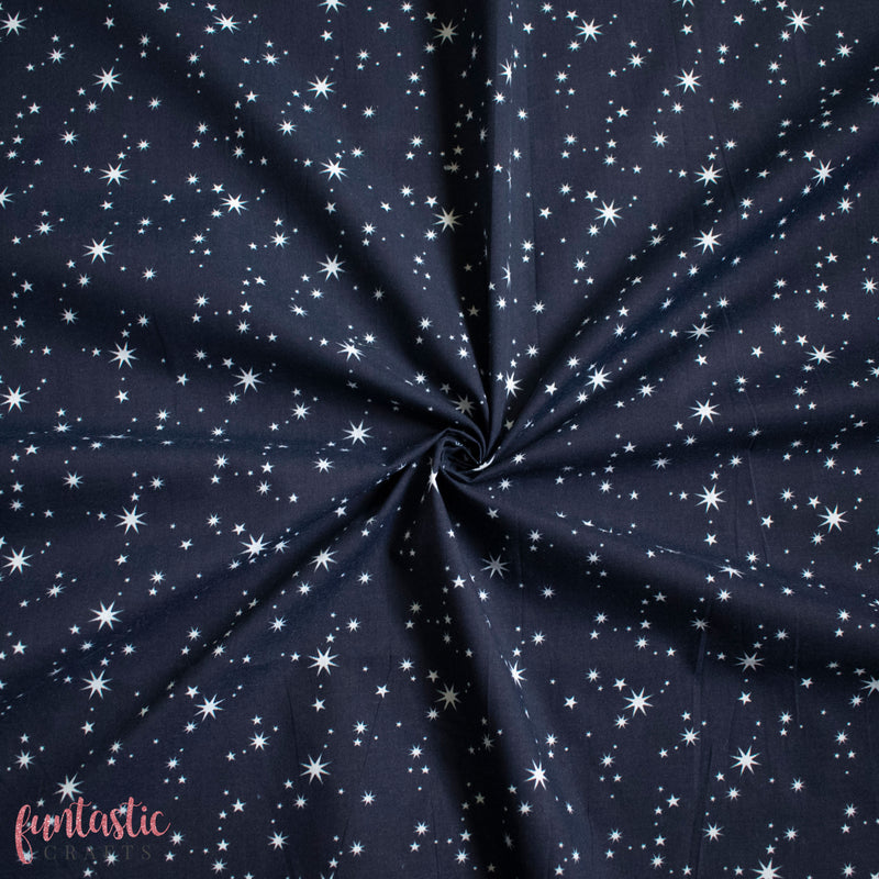 White Christmas Stars on Navy Blue Polycotton Fabric