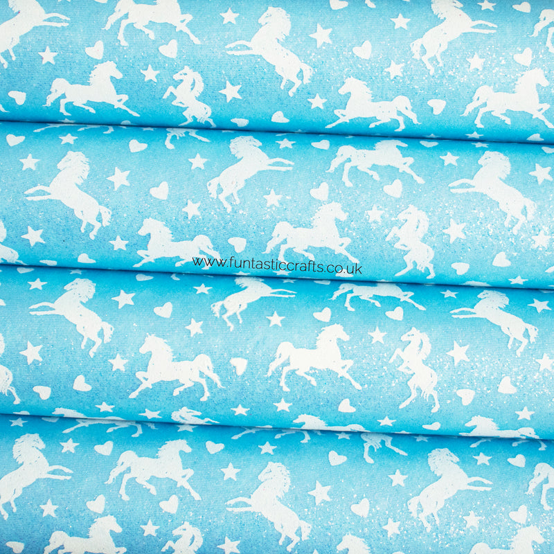 Sky Blue Glow in the Dark Unicorn Print Fine Glitter Fabric