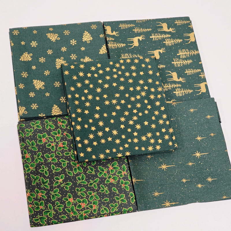 Set of green fabrics with gold patterns on a white background