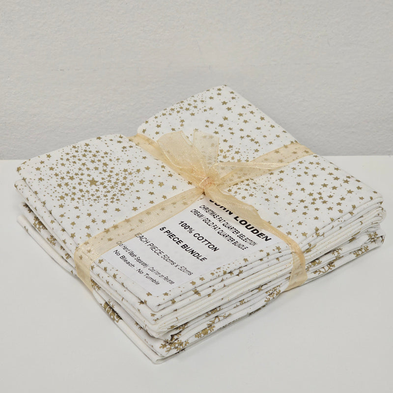 Folded fabric bundle with a label on a light gray background