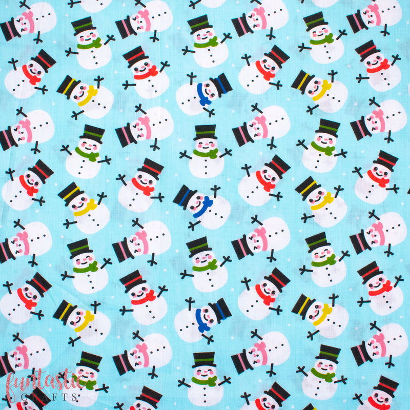 Smiley Snowmen on Blue Polycotton Fabric