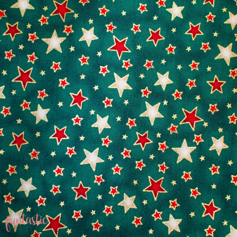 Dazzle Stars on Green 100% Cotton Christmas Fabric