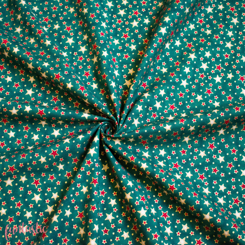 Dazzle Stars on Green 100% Cotton Christmas Fabric