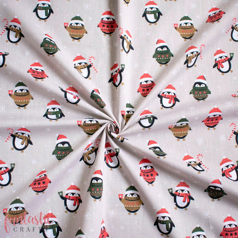 Penguins in Christmas Jumpers on Silver Polycotton Fabric