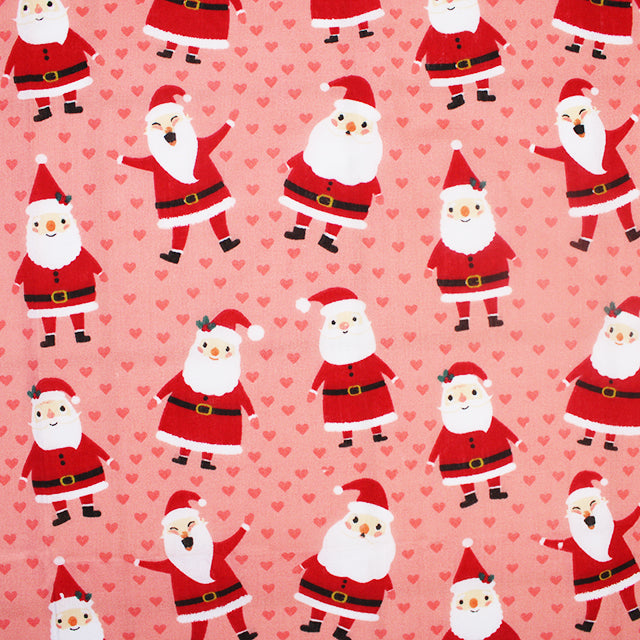Smiley Santa on Pink Polycotton Fabric