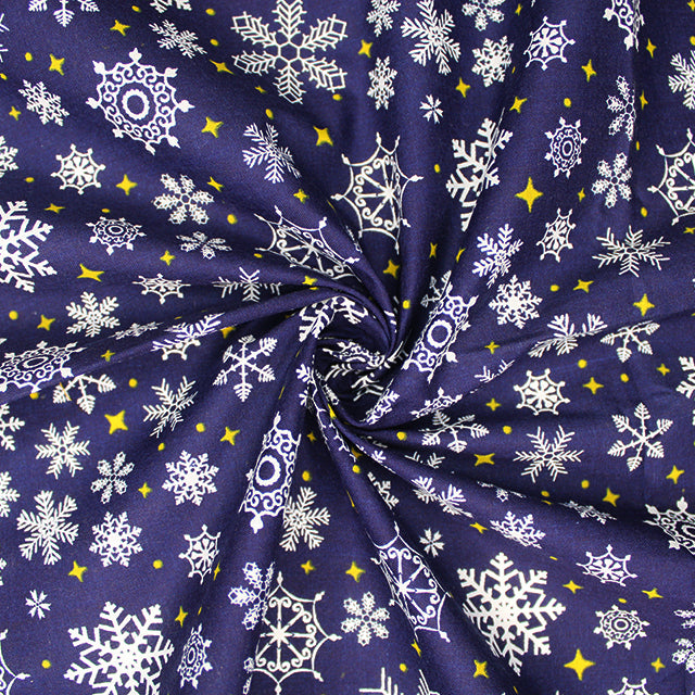 Snow and Stars on Navy Polycotton Fabric